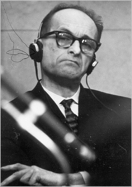 Eichmann listens to testimony given at his trial